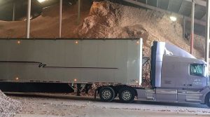 Semi truck with corn background