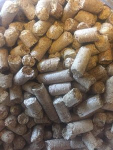 Close-up of compressed wood pellets for fuel or heating use.