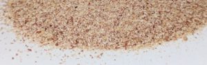 Close-up of seasoned breadcrumb mixture for cooking or baking.