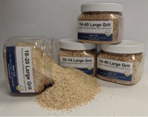 Assorted containers of natural corn cob grit for pet and industrial use.